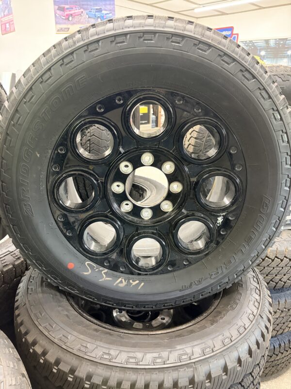 2005–2026 Ford Superduty 20" Black Rims and LT275/65R20 Bridgestone Dueler A/T Tires